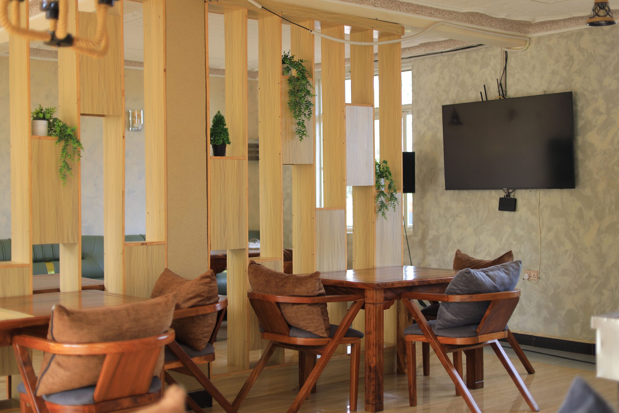 On-site restaurant serving authentic Ugandan food and international cuisine at HK Hotel Mubende